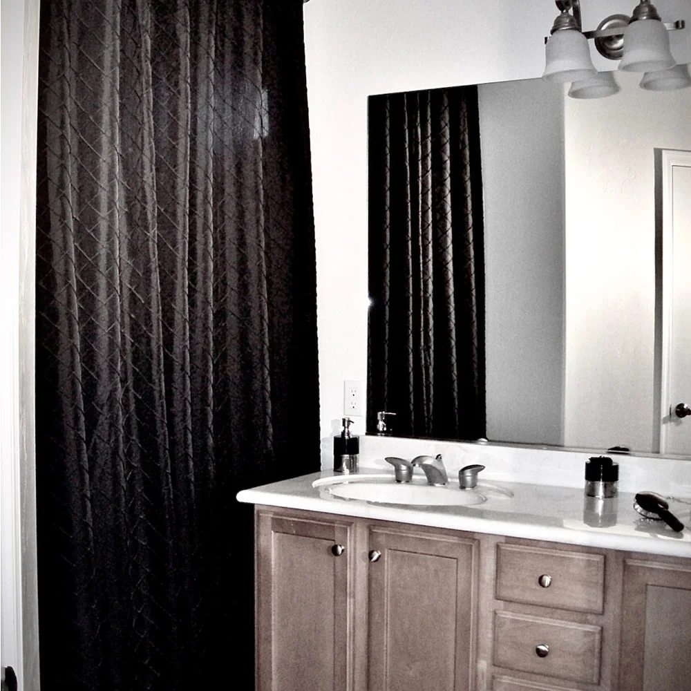 Grommet top shower curtain. Black with silver grommets